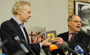 Elmer (right) and the symbolic handover