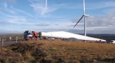 Wind turbine blade on truck Wind turbine blade being transported on a truck