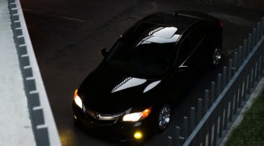 black car in parking garage