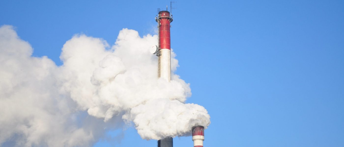 factory tower emitting gases