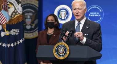 President Joe Biden speaks from a podium President Joe Biden speaks from a podium