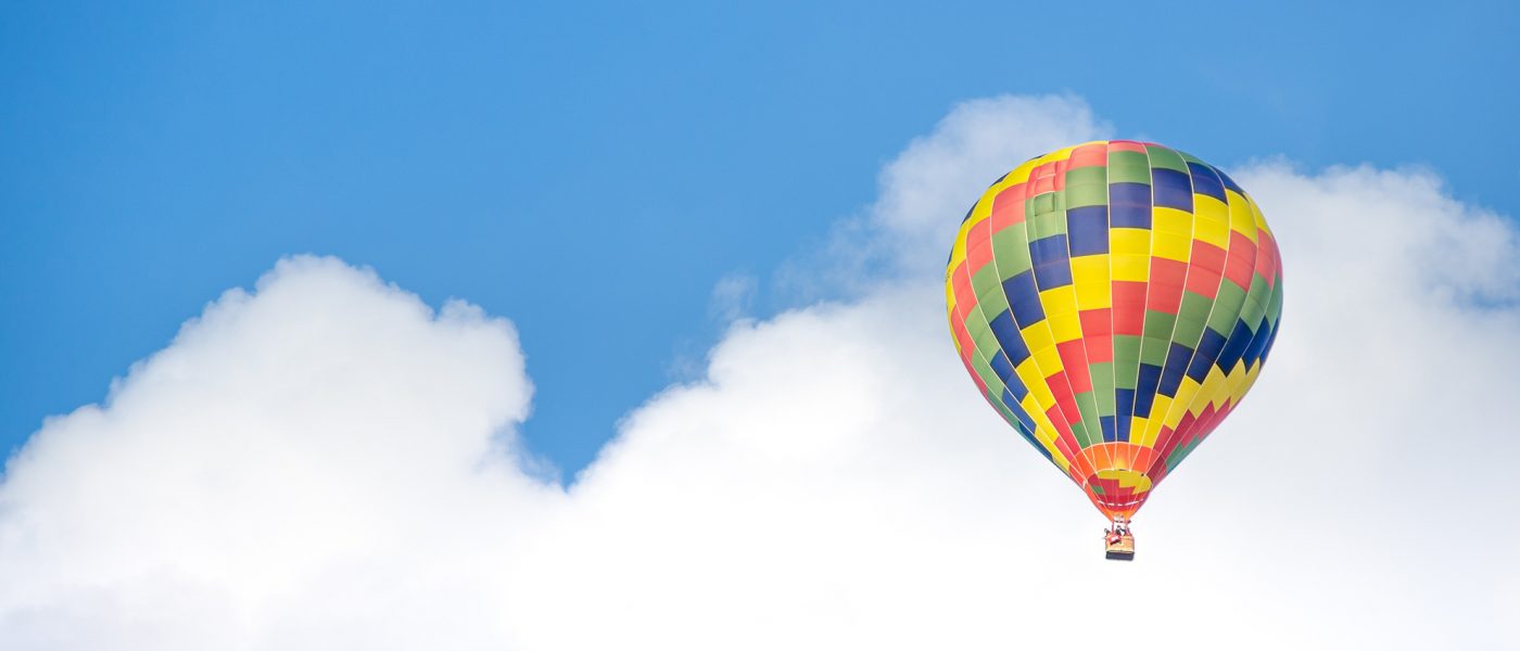 hot airballoon A hot air balloon in front of a blue sky