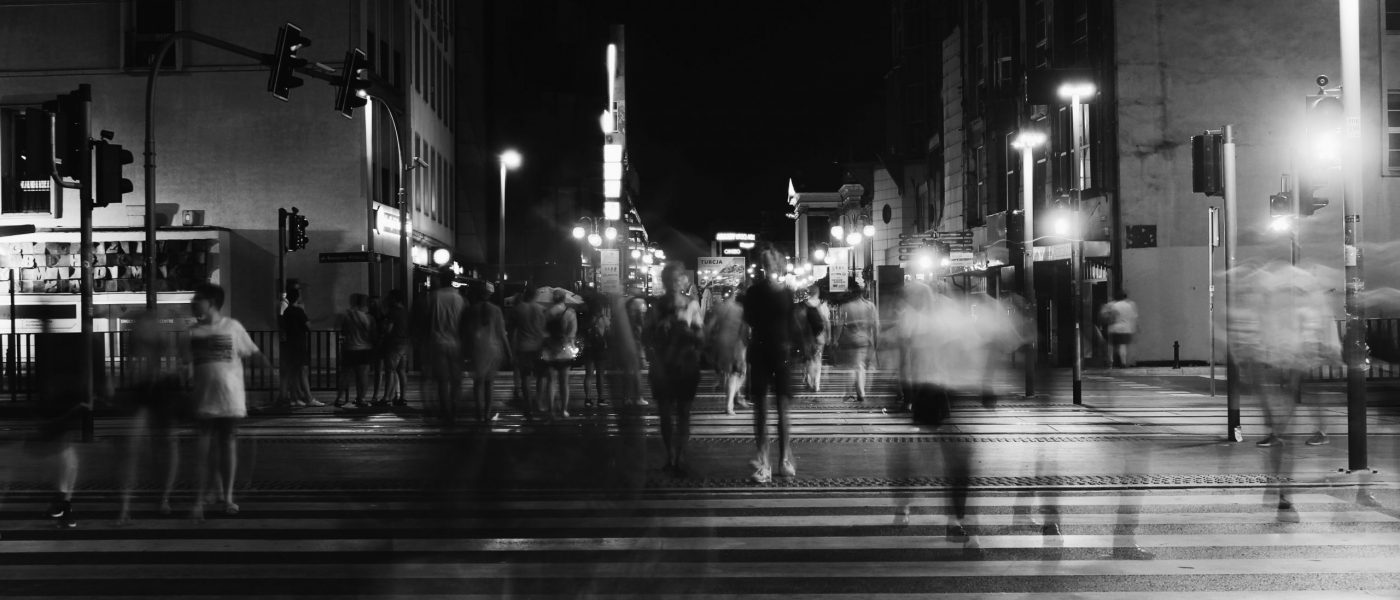 architecture-black-and-white-buildings-1309687 Black and white photo of a blurred people crossing a road