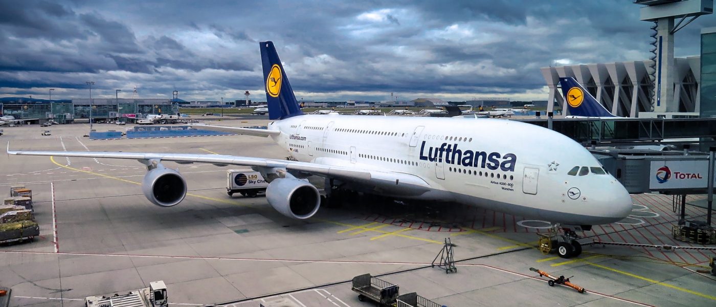 a380-air-airbus-aircraft-358220 A parked Lufthansa air plane on a cloudy day