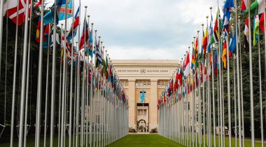 United-Nations-rows-of-flags Two rows of national flags outside of a UN building