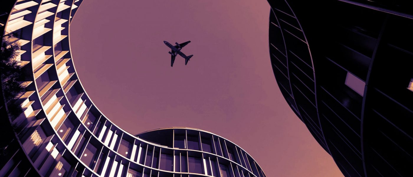 Denmark, Copenhagen building, plane A plane flies over the Axel Towers in Copenhagen, Denmark