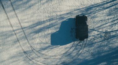 Jeep u-turns in the snow A jeep u-turns in the snow
